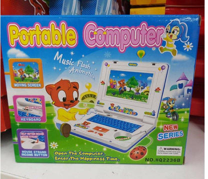 Roze laptop za dečju igru prikazan je kao plastična muzička igračka.