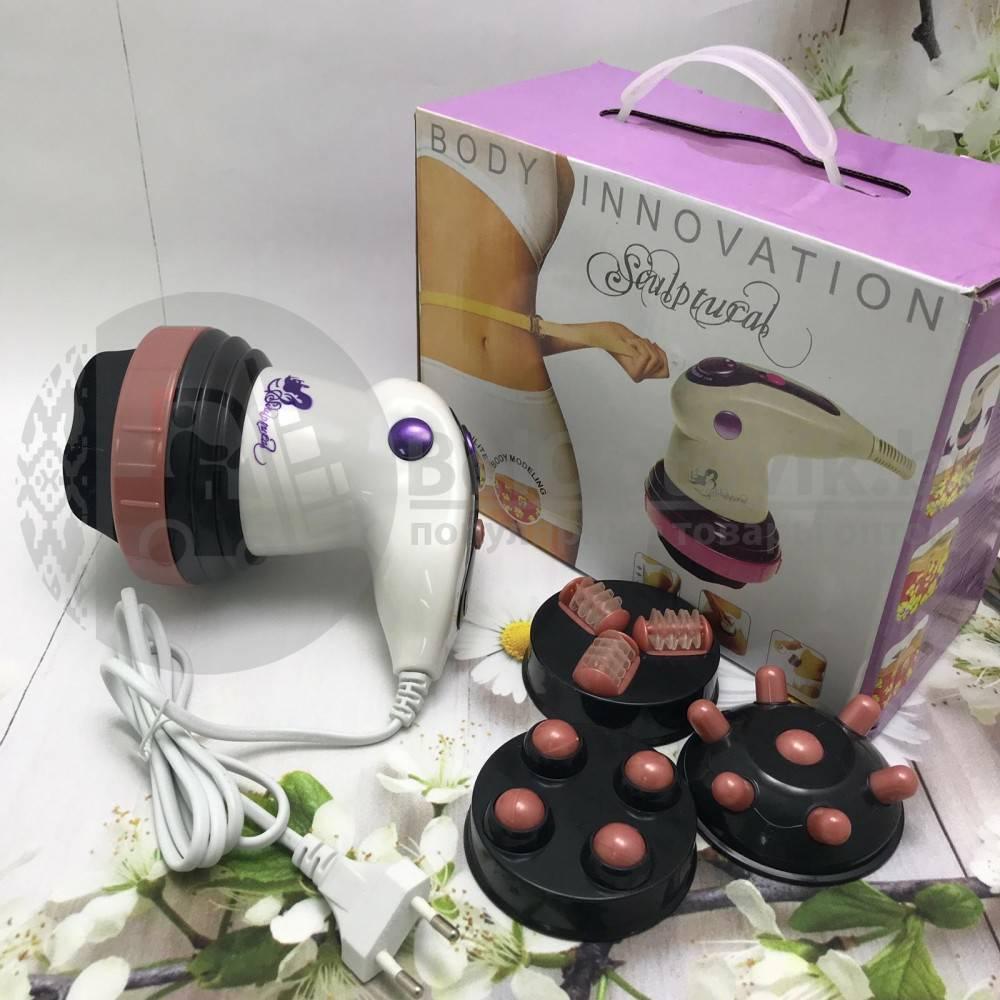 Masažer za telo sa šest zamenljivih glava.