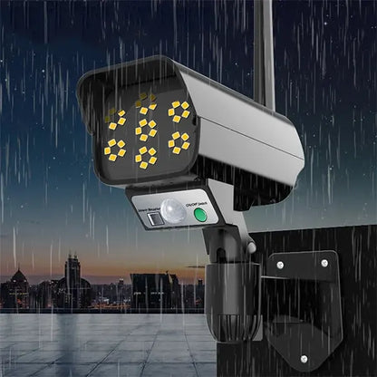 Solarni LED reflektor u formi sigurnosne kamere.